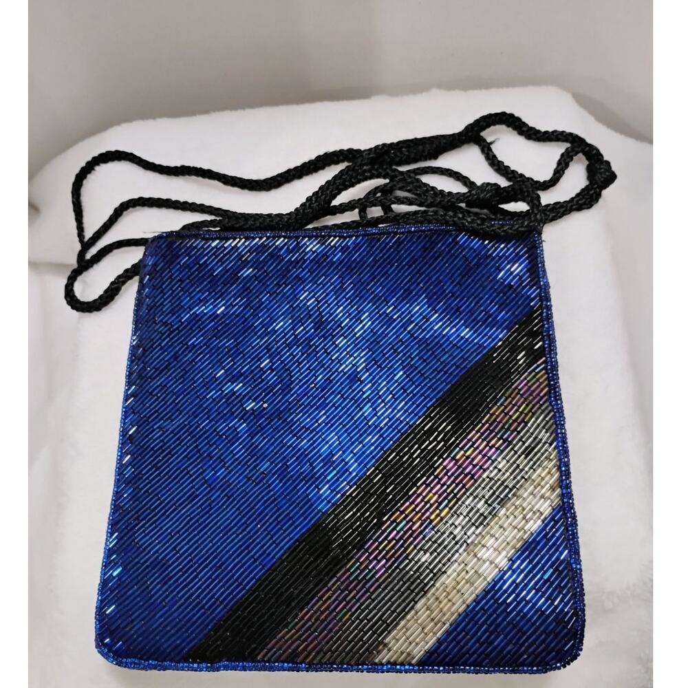 Blue Beaded handbag with satin dustcover